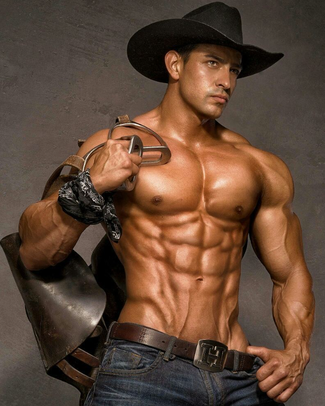 Male stripper dressed in bold cowboy outfit with hat
