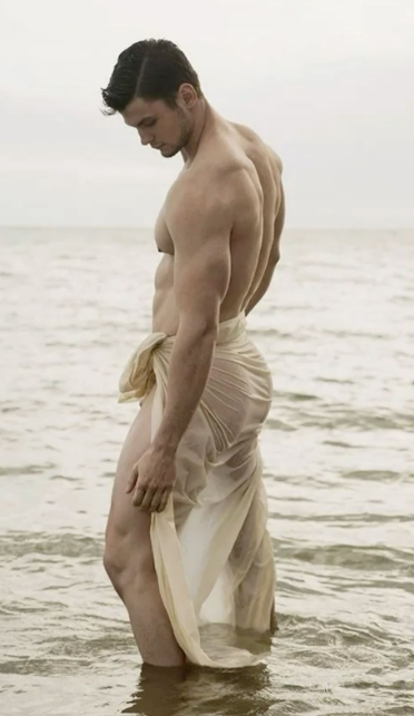 Classic standing male nude photography pose